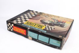 A Tri-ang Scalex set '50' and a set of straight tracks.