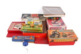 A collection of assorted vintage traditional family board games and toys.