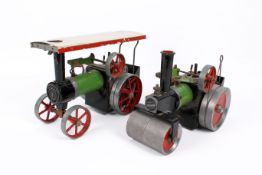 Two Mamod live steam model engines. Including a roller and a tractor.