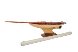 A vintage wooden model pond yacht 46cm long. With 60cm mast, design plans, etc.