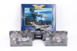 Three modern diecast model vehicles.