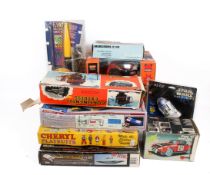 A collection of assorted vintage and modern toys.