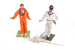 Two vintage Action Man figures.