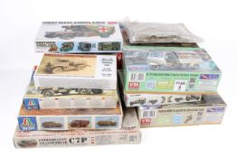A collection of assorted plastic model maker's kits mostly military vehicles, all boxed.