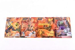 A collection of four Hasbro Action Man figures, carded. Including Operation Sahara, Dr.