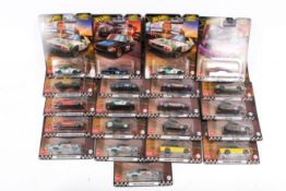 A collection of carded Hotwheels diecast model cars.