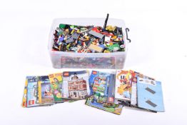 A large quantity of modern Lego bricks, parts, pieces. Including instruction booklets, etc.