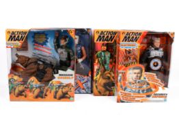 A collection of four assorted Hasbro Action Man figures, boxed.