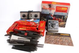 A collection of vintage Tri-ang 00 gauge model railway train set items, mostly boxed.