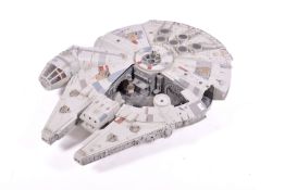 A Star Wars model Millennium Falcon spaceship, possibly Hasbro.