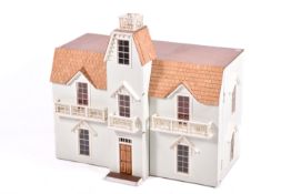 A modern dolls house with furniture.