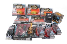 A group of assorted Star Wars collectables, mostly action figures from Rogue One, all boxed.