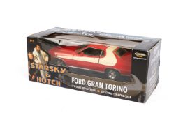 A 1:18 scale American Muscle 'Starkey and Hutch' Ford Gran Torino diecast car. In the original box.