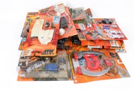 A collection of assorted Hasbro Action Man carded accessories. Including weapons and uniforms, etc.