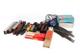 A 00 gauge model railway train set, with four locos.