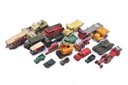 A collection of assorted vintage playworn Dinky Toys diecast vehicles.
