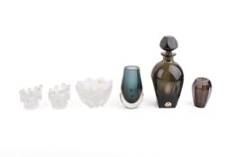 A collection of six vintage glassware items.