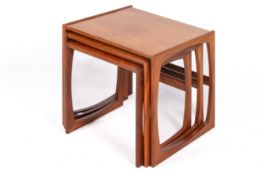 A mid-20th century G-Plan 'Quadrille' nest of three tables.