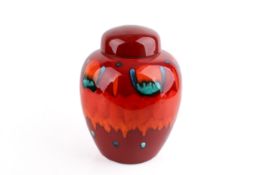 A large 20th century Poole Pottery ginger jar with lid in 'Volcano' pattern.