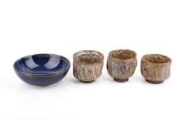 Four 20th century art pottery bowls.
