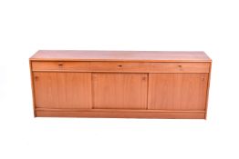 A mid-20th century Danish made teak sideboard. Stamped Made in Denmark to the reverse.