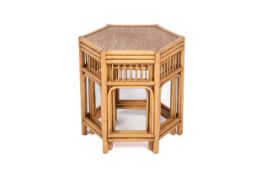 A pair of vintage. hexagonal bamboo side tables of graduating size.