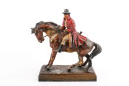 A cold painted table lighter drilled as 'Dick Turpin', dated 1938.