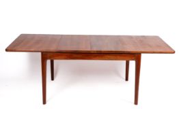 A mid-20th century Danish solid teak dining table by Glostrup.