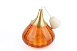 A 20th century, retro amber pendant lamp. Conical form with brush metal top.