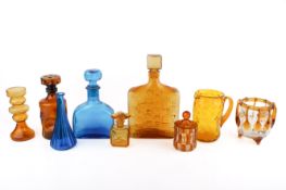 Nine mid-century orange and blue coloured glass items.