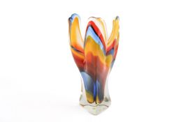 A 20th Century Iwatsu Hineri lobed glass vase in vibrant yellow, blue and orange colours.