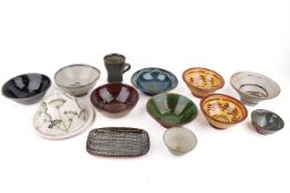 A group of vintage studio pottery items.