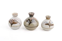 Three David Leach (British, 1911-2005), mid-20th century studio pottery stoneware bud vases.