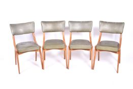 A set of four 1960s beech framed Ben chairs of Stoe. Green imitation leather backrests and seats.