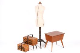 A tailor's dress makers dummy along with three vintage sewing boxes.