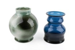 A 20th century hand blown blue glass vase along with a vintage ceramic green speckle glazed pottery