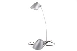A Dar Lighting, Themis 4032 multi-poise desk lamp. Raised on a grey conical base.