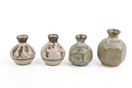 Four David Leach (British, 1911-2005), mid-20th century studio pottery stoneware bud vases.