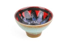 A 20th century small Poole Pottery stepped bowl.