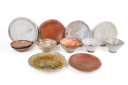 A collection mid-century Danish design, glazed earthenware dining plates and bowls.