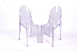 Two Phillipe Starck perspex 'Ghost' chairs for Kartell. Labelled to the reverse.
