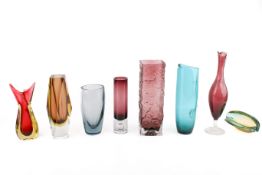 Eight vintage coloured studio glass vases together with a Whitefriars style bark vase and a moulded