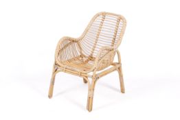 A vintage bamboo armchair with slat back and seat.