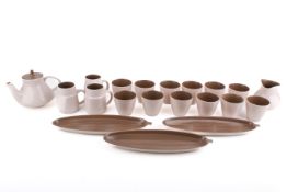 A vintage Poole Pottery, twintone cream and mushroom tea set.