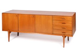 A large Danish mid-20th century teak sideboard.