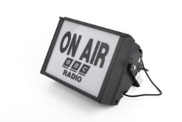 A retro style BBC radio studio 'On Air' light box with wall mounting bracket.