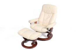 A Stressless off-white chair and matching footstool. Reclining seat on swivel base.