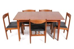 A Danish style, mid-century teak extending dining table and five chairs.