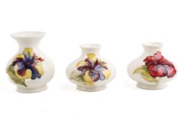 Three small Moorcroft pottery items.