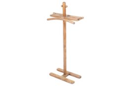 A 20th century retro beech valet stand with atomic ball detailing to the upright and towel rail.